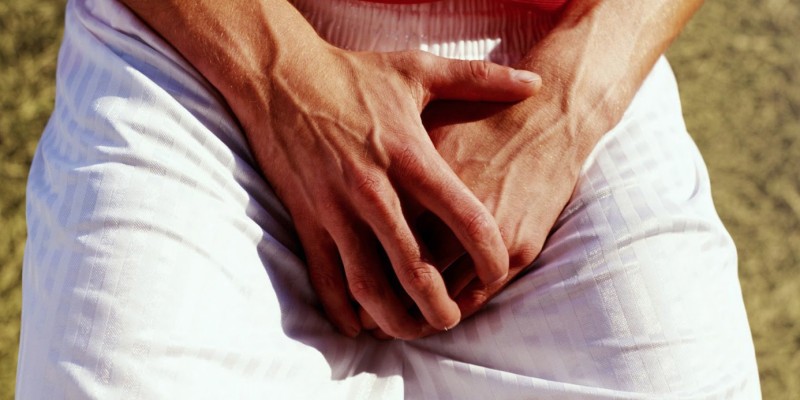 Почему болят яички у мужчин: причины и лечение
